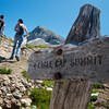 A weathered sign points the way to the top.