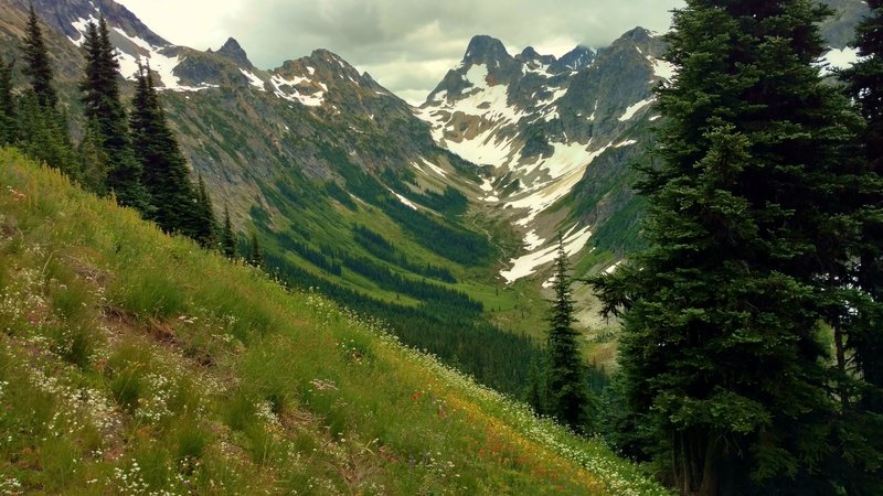 The Fisher Creek basin with Mt. Fisher rising above it (center) as seen from the Fisher Creek Trail switchbacks on the way to Easy Pass