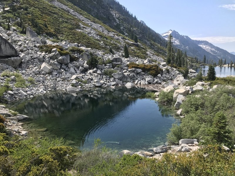 View of small lake on Upper Canyon Creek Lake outlet in Trinity Alps Wilderness