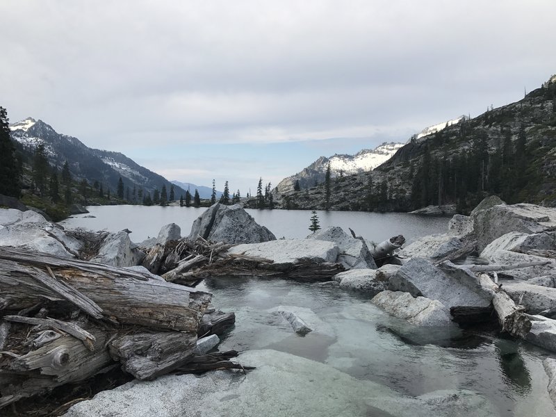 Crossing Upper Canyon Creek Lake outlet in Trinity Alps Wilderness