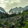 Park Creek Pass is the gap in the wall of Mountains ahead, as seen from Thunder Creek Trail