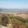 View west overlooking the Santa Rita Experimental Range and wildfire damage from the 2017 Sawmill Fire (the area the appears reddish in the middle of the photo)