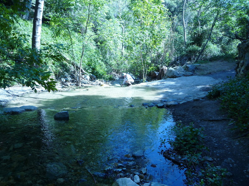 Linda take a break by the stream