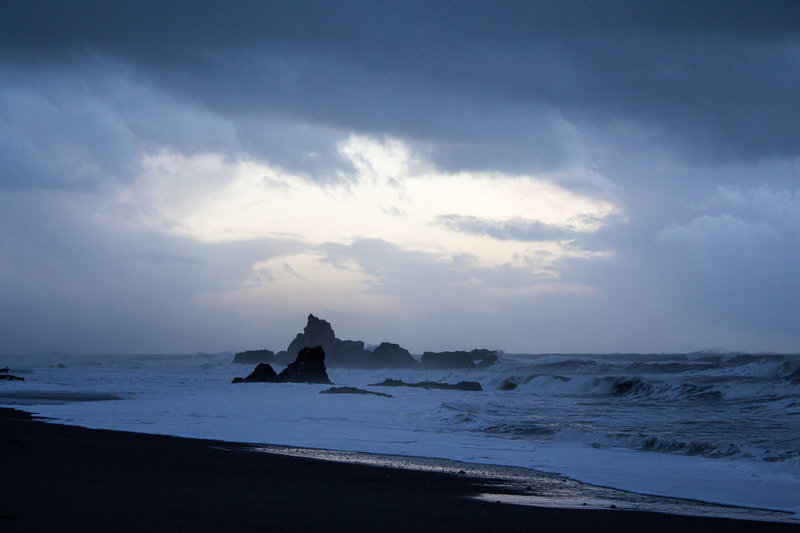 Sunset over the ocean on a cloudy winter day.