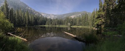 Sugar Lake in Russian Wilderness with patchy wildfire smoke.
