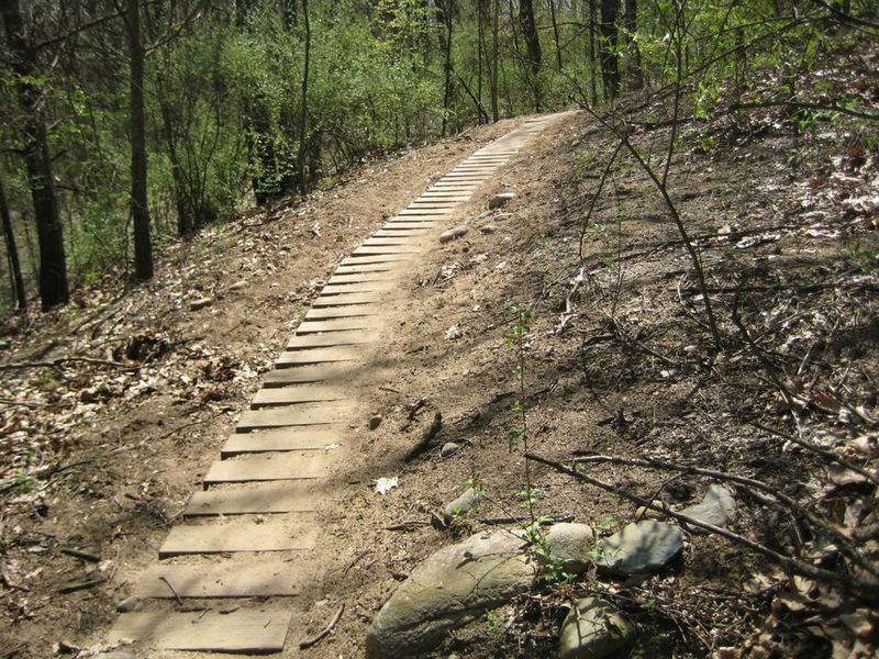 uphill treated lumber armoring through a sandy section