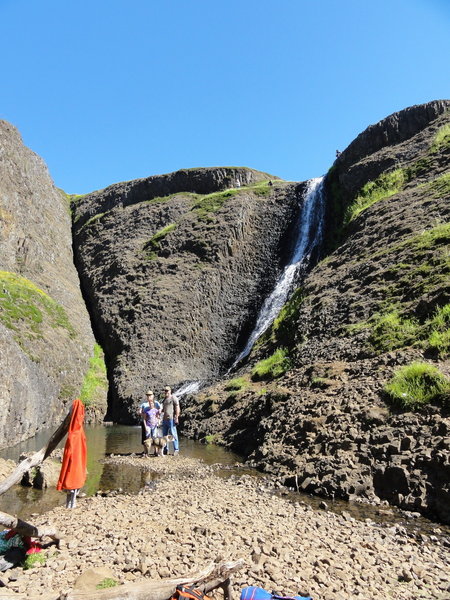 Random folks pose at a smaller waterfall at the southern edge of Table Mtn.