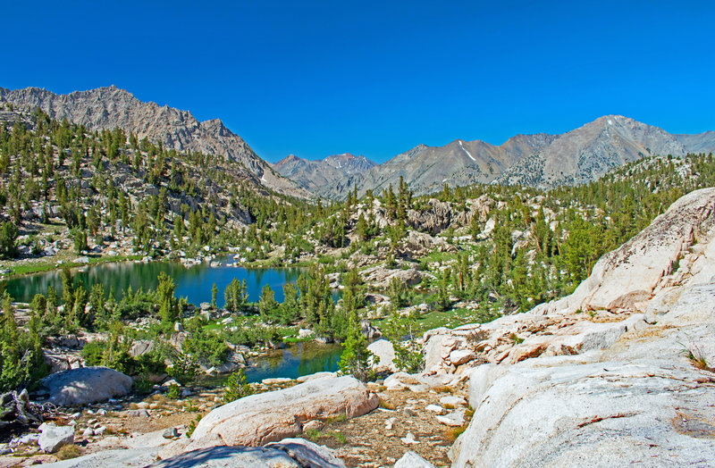 Looking north from the beginning of the gently sloping Sixty Lakes Basin Canyon. Mt. Clarence King is on the left. The mountains in the distance are on the far side of the South Fork of the Kings River and the JMT