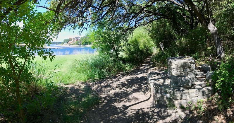 The stone sitting bench is a nice spot to take a pic and hang out for while under the shade