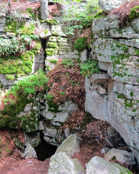 Hot day? Take a moment to rest near this cave. You can feel frigid air wafting up to meet you and cool you down.