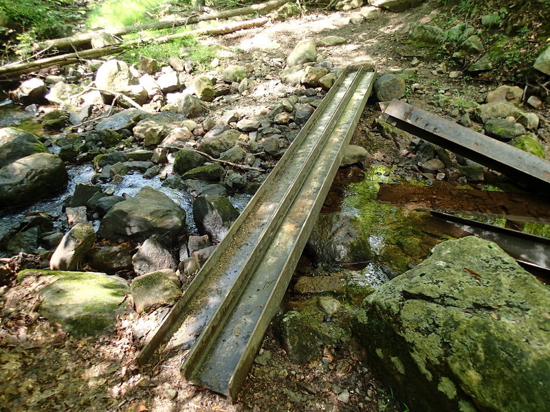 Cross a stream where the Fahnestock Trail joins the the School Road Trail