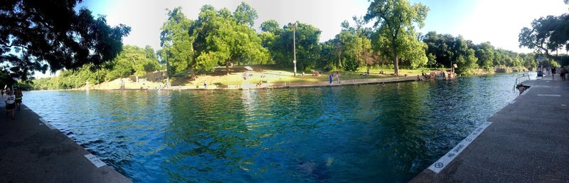 Barton Springs at Zilker Park... a small fee to get in (like 3 bucks). If you are on the Barton Creek Trail, this is a nice stop to eat lunch and take a cool dip.