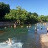 View from Barton Springs out towards the spill out creek finger that heads to the river.  This is a weekday! Weekends are a bit overcrowded (expect to share the space with friendly 4:20 peeps).
