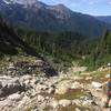 Ascending the Lateral Moraine and looking back at the water source above Glacier Meadows Camp