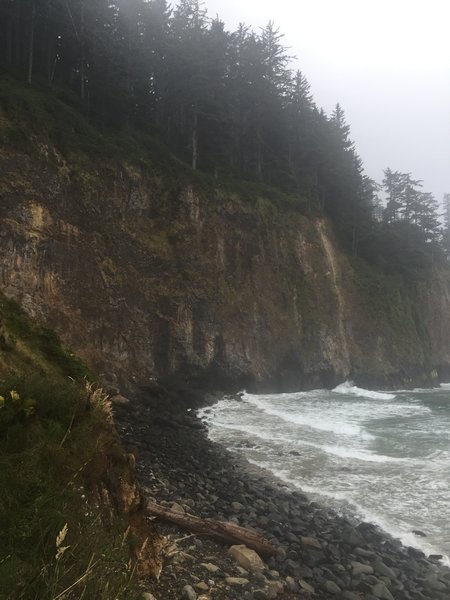 The rocky beach and majestic cliffs at the end of the Cape Meares Beach Trail