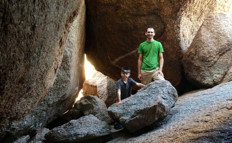 Notice the white arrows painted on the rocks....marks the entrance and direction down into the "rock caves" .... if you don't like dark, cramped, and technical exploring... just do the the photo op at the entrance :)