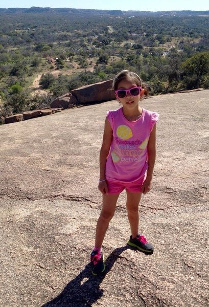 Wearing pink improves hiking moral! Lots of sun and leg work on the open rock flats to the summit.