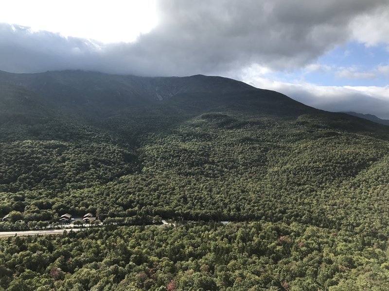 Late-day clouds cover the summit of Mount Washington as seen from Square Ledge.