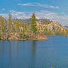 Lower Buck Lake is deep and narrow, with inlets and rocky points.