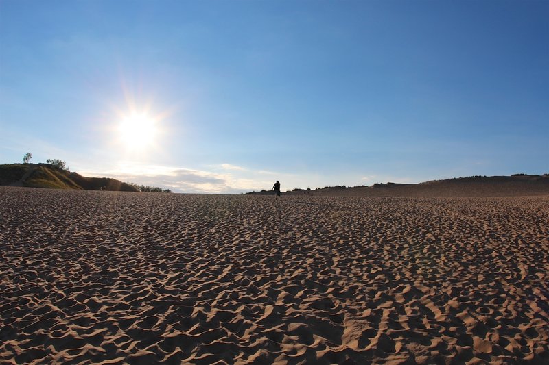 Climbing on sand dunes.