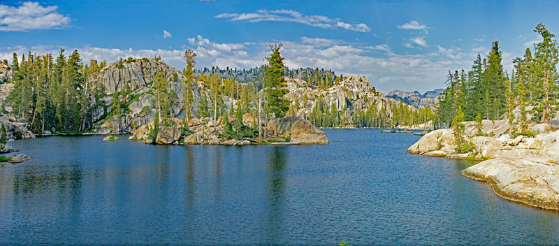 Letora Lake, with its polished granite islands and inlets that extend beyond the picture, is well worth a day's exploring, swimming, and resting.