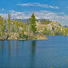 Letora Lake, with its polished granite islands and inlets that extend beyond the picture, is well worth a day's exploring, swimming, and resting.