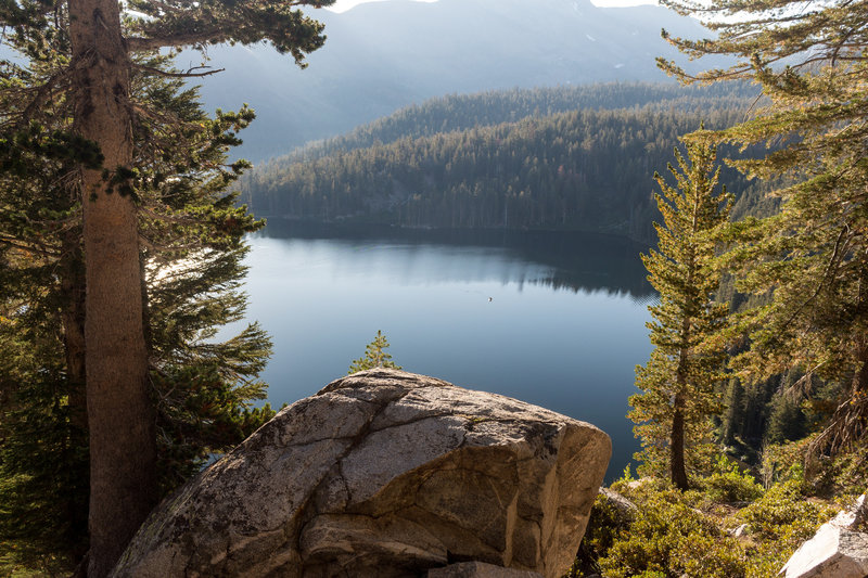 Lake George through the trees on Mammoth Crest Trail.