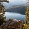 Lake George through the trees on Mammoth Crest Trail.