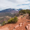 Trail junction of LPS and Porcupine Rim, with an overlook to the La Sals and Castle Valley.