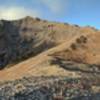 Looking up the ridgeline to the summit of Mount Healy from atop the first climb.