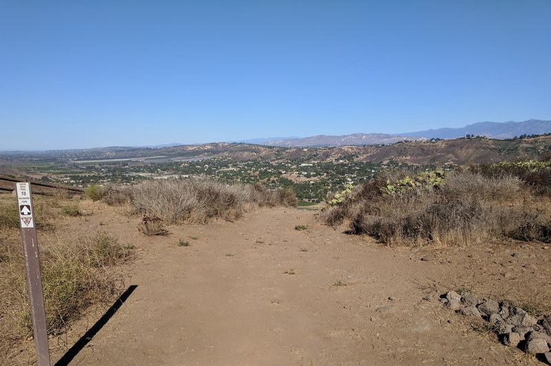 Looking northwest from a high point of the trail. Santa Rosa Valley is ahead and the mountains of northern Ventura County are in the distance.