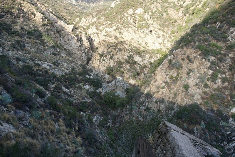 A precariously perched railway remnant juts out over the steep slopes of Castle Canyon.