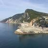 Stunning views looking back on Porto Venere (San Pietro church at center and Castello Doria on the hill at right) and up towards the Cinque Terre