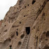 Waiting for a chance to enter a cliff dwelling