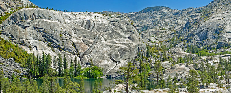 Spectacular Lake 5774. From here it does not look difficult to climb up the canyon towards Edith Lake, but with polished granite even an 8 foot cliff can stop non-rock climbers and avoiding cliffs leads to thick, deep brush.