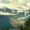 Robson River at its sources - Lynx Mountain (left), Resplendent Mountain (right), Robson Glacier (center right), and other snowy peaks. Looking southeast from high on Mumm Basin Route.