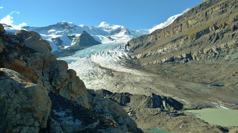 Robson Glacier with Resplendent Mountain at 11,240 ft., in the distance (center). Mt. Robson is hidden behind the shoulder of Rearguard Mountain on the right