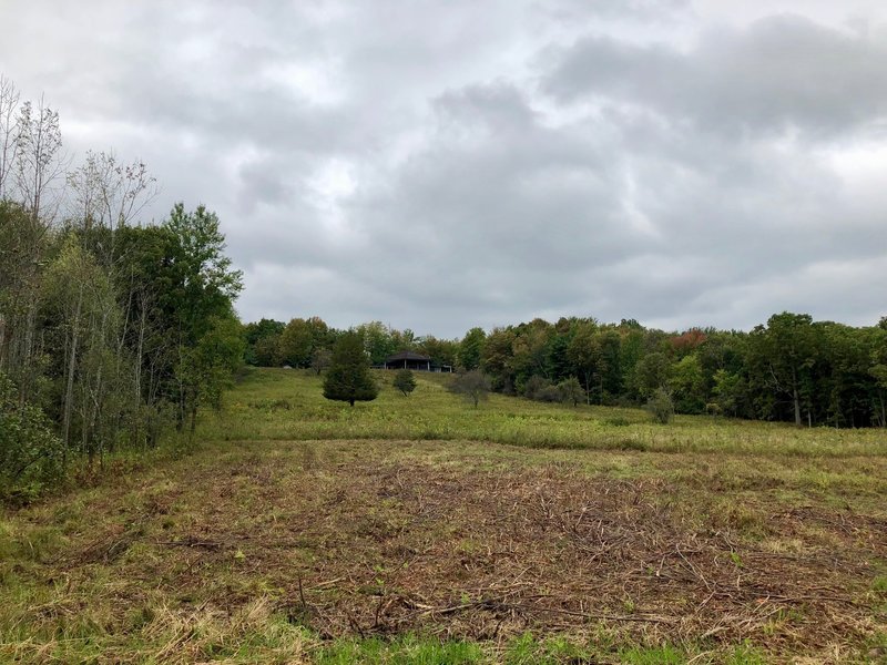 Looking back at the visitor center from the fields below.