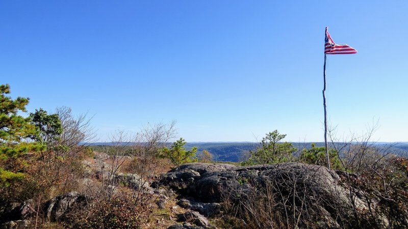 Winds whip the American Flag atop Prospect Rock off the Appalachian Trail in southern NY State