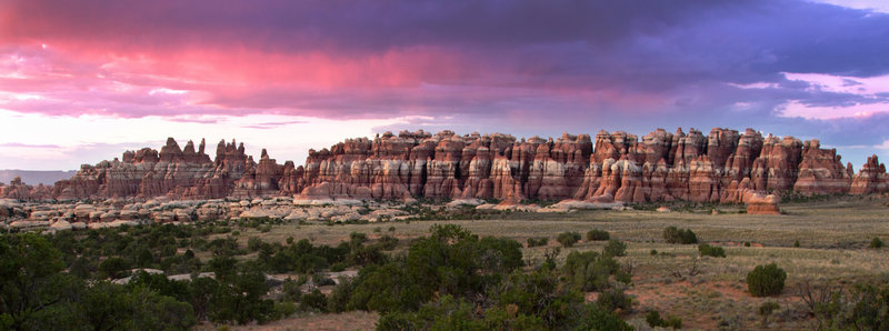 Sunset in Chesler Park. The rock formations on the south end of the meadows are a great spot for sunrises and sunsets, and also provide some shade.