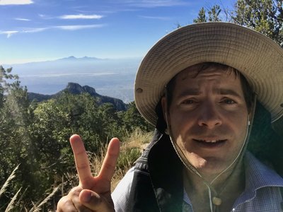 On Mount Kimball with Mount Wrightson looming in the background