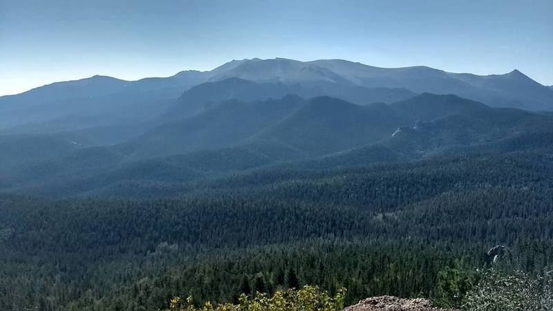 Forest and mountains view from the summit