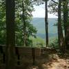 Bench at an outlook over the Youghiogheny River Gorge at the far point on the McCune Trail