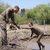 Marine Volunteer at the Final Mud Pit
