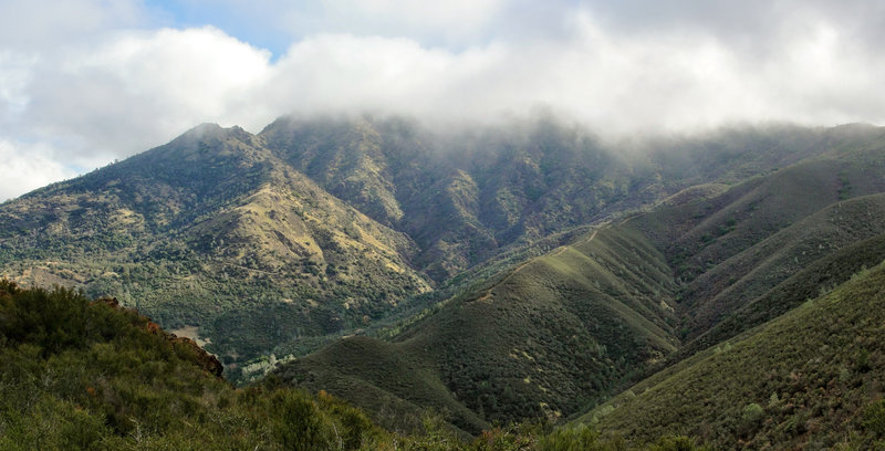 North Peak in the clouds seen from the Eagle Peak Trail.