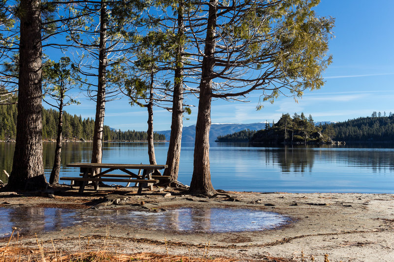 Picnic table at the edge of Emerald Bay