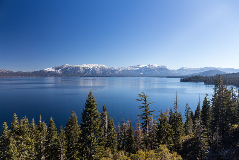 Lake Tahoe on a sunny day after the first snow in fall