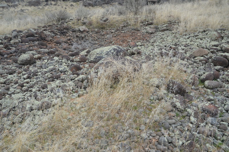 Very center of a pothole showing what was left of huge boulders