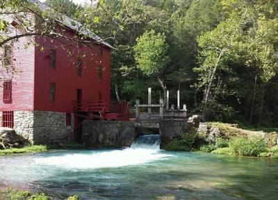 Alley Mill with the flood gate to Alley Spring open.