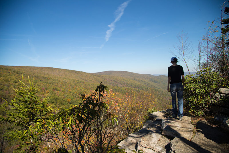 Stepping out onto the War Spur Overlook with grand views of the Mountain Lake WIlderness